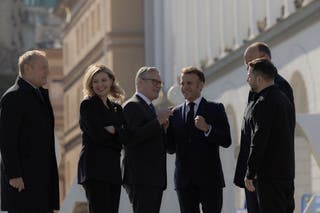 (From L) Poland's Prime Minister Donald Tusk, Olena Zelenska, Britain's Prime Minister Keir Starmer, France's President Emmanuel Macron, Ukraine's President Volodymyr Zelensky and Germany's Chancellor Friedrich Merz visit the Independence Square (Maidan) in Kyiv